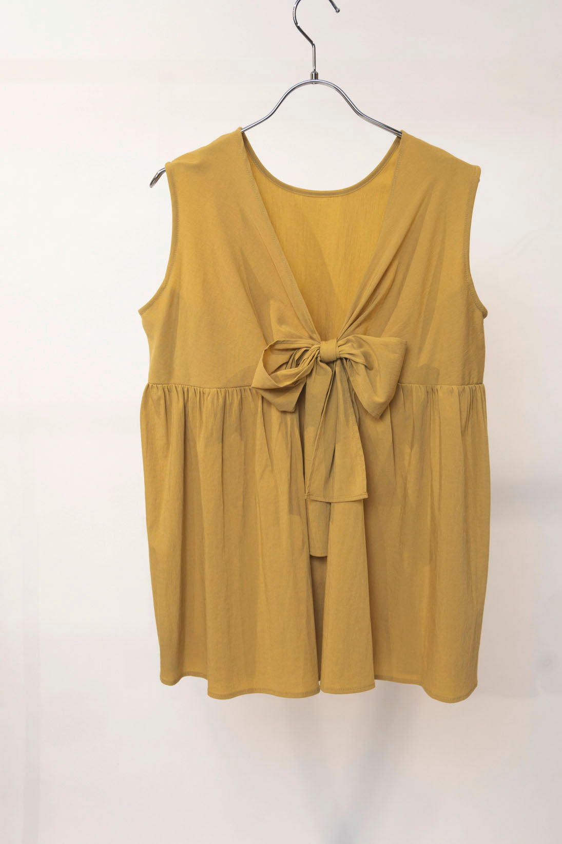 Back ribbon sleeveless tunic